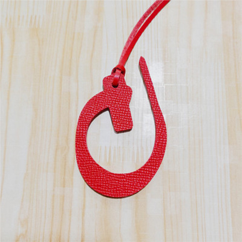 Llavero con letras árabes del  - Luxury Bags Made In China reseña y precio